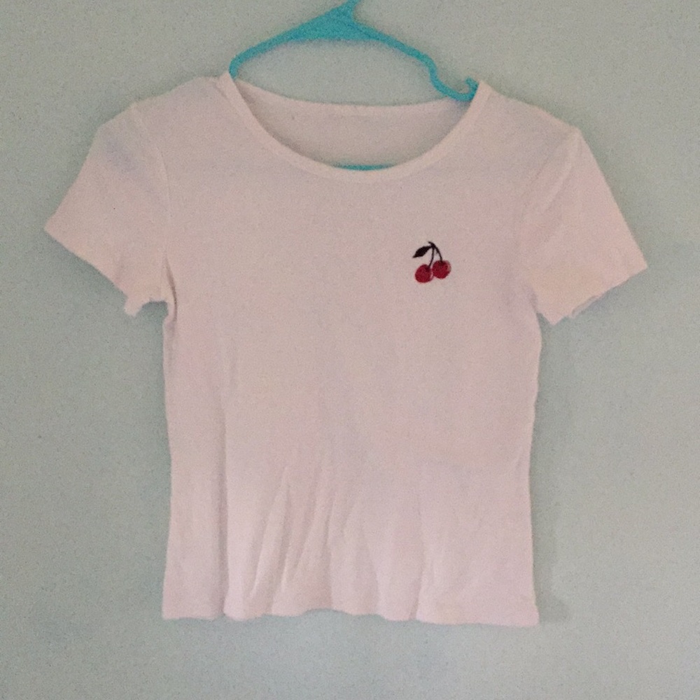 Plain white tee with a cherry